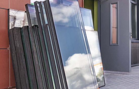 new-sealed-glass-units-building-site-storage-preparation-installation-windows